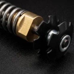 Vista lateral del Damper Mass Energy – Componente de amortiguación inercial para MTB